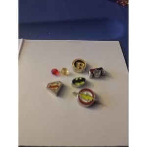 Batman charms Harley Quinn Superman